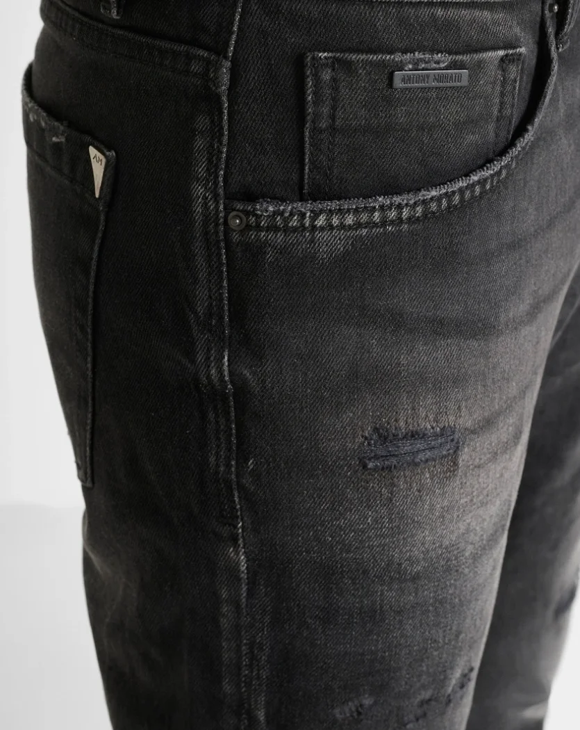 VAQUEROS MORATO SLIM CROPPED FIT “JIMI” EN DENIM NEGRO DESGARRADO