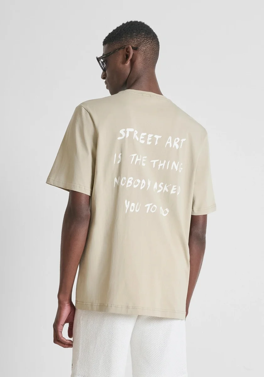 CAMISETA MORATO RELAXED FIT DE ALGODÓN STREET ART BEIGE