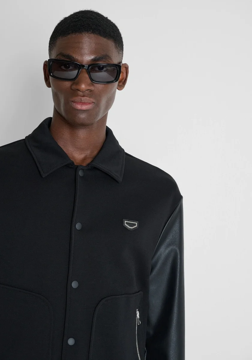 Bomber Morato negro regular fit en mezcla de algodón con logo en silicona y placa metálica en el hombro