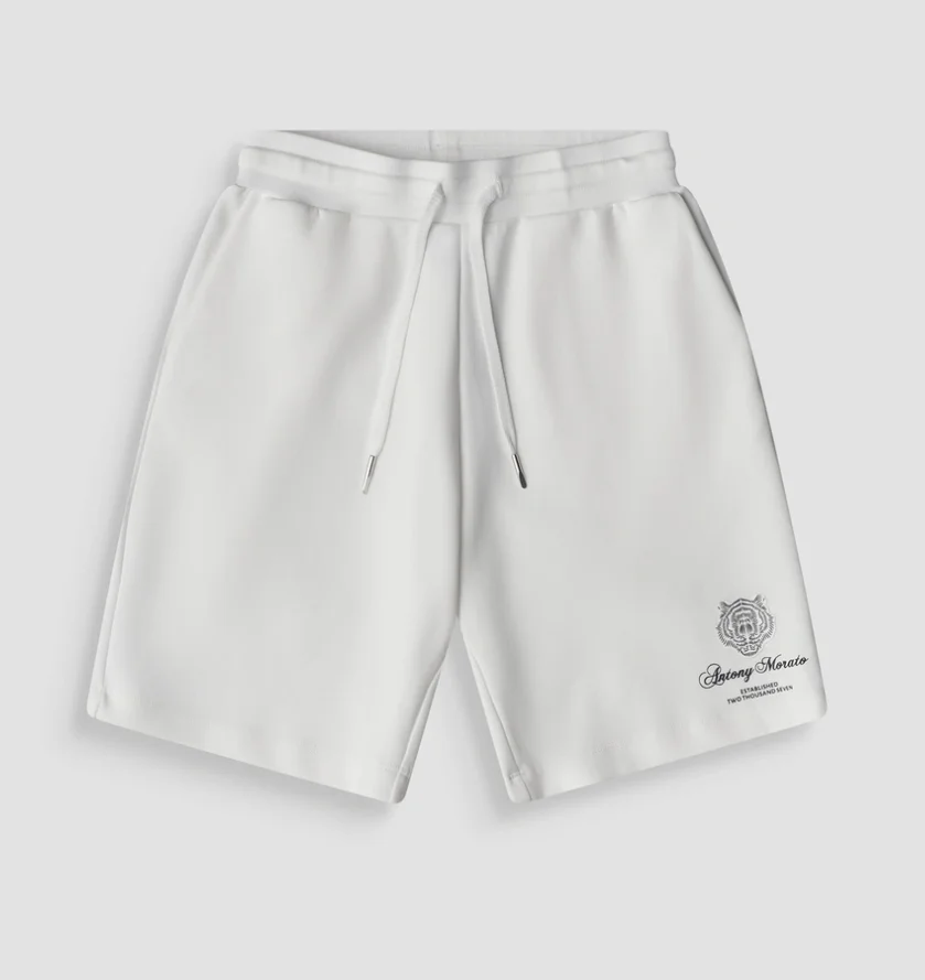 PANTALONES CORTOS REGULAR FIT DE MEZCLA DE ALGODÓN CON ESTAMPADO DE TIGRE