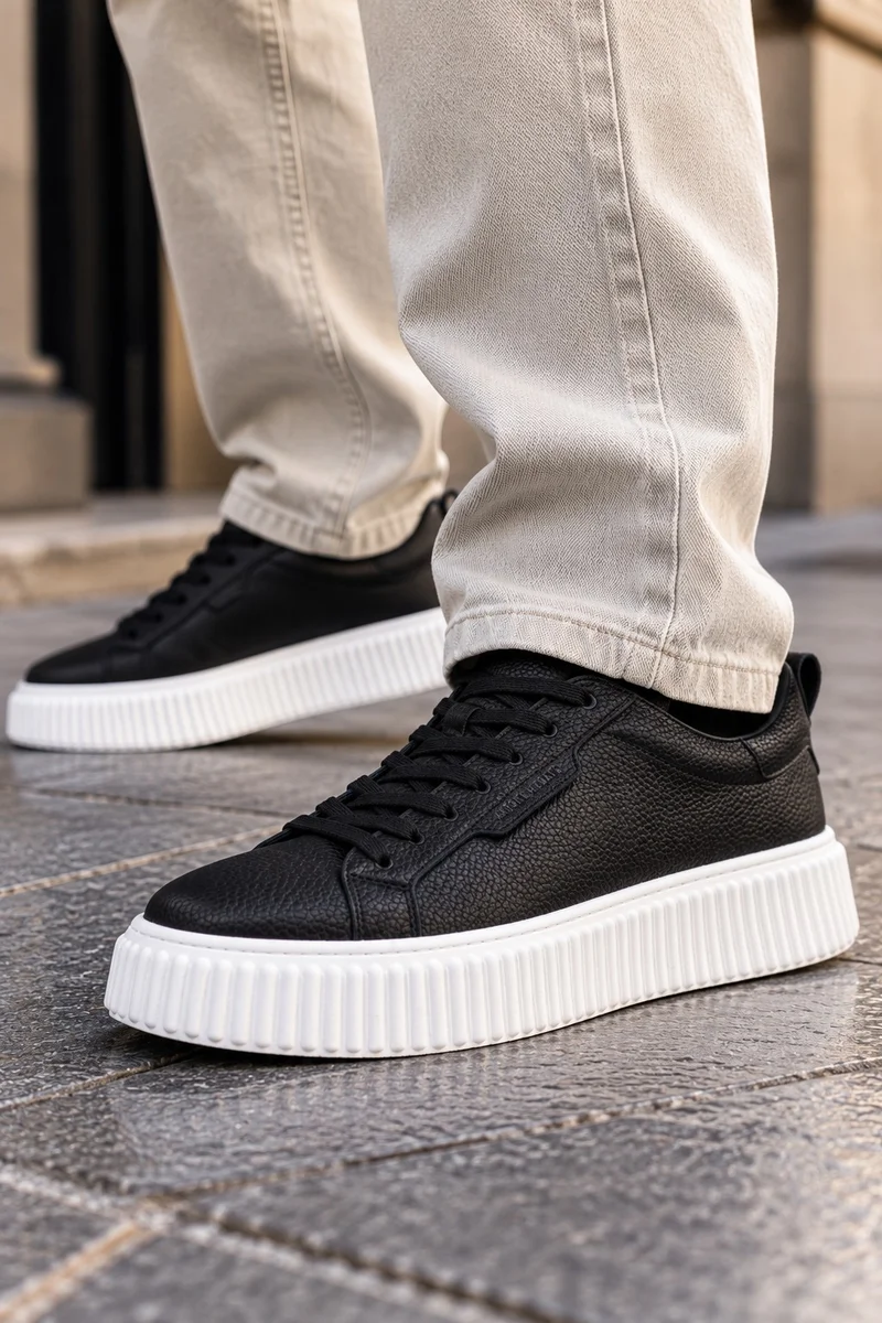 Zapatilla Morato "Hopper" negra en piel granulada con logo 3D laminado y suela plataforma con motivo cordón
